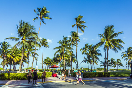 MIAMI, USA - AUG 23, 2014: people walk along the promenade at ocean drive at Miami, USA. Ocean drive is the most popular street in South Beach.のeditorial素材