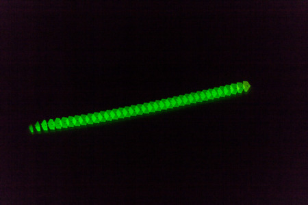 abstract pattern of light points in a rowの写真素材