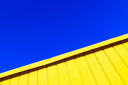 yellow wooden background of beach huts in Miamiの写真素材