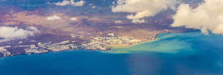 aerial of Lanzarote with volcanoes in cloudsの写真素材