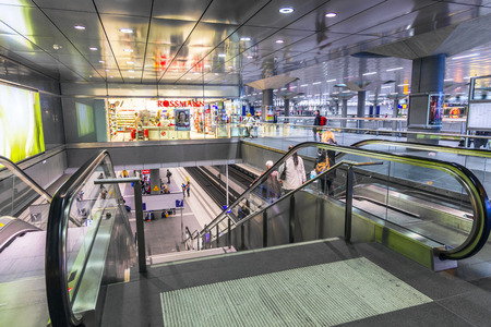 BERLIN, GERMANY - NOV 27, 2014: People inside the Berlin Central train station in Berlin, Germany....