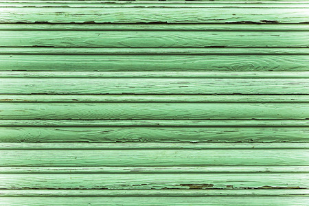 a shuttered roll up blue wooden windowの写真素材