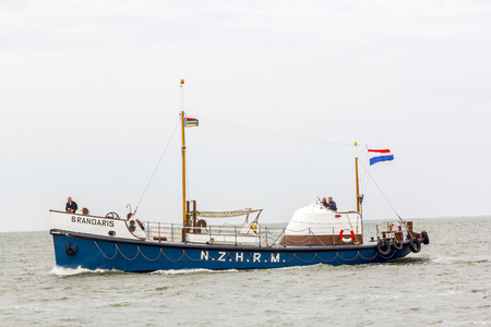 NORTH SEA, NETHERLANDS - AUG 10, 2014: historic lifeboat Brandaris at the North Sea, Netherlands. Shipyard Talsma  restorated the famous lifeboat , which served on Terschelling from 1923 to 1960.のeditorial素材