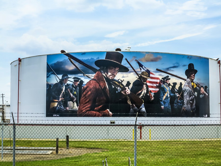 LA PORTE, USA - JULY 11: oil paintings on the tanks on July 11, 2013 in La Porte, USA. In Lynchburg near the San Jacinto Monument oil tanks are painted with historic texas history scenes.のeditorial素材