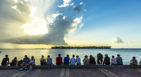 KEY WEST, USA - AUG 26, 2014: people enjoy the sunset point at Mallory square in Key West, USA. This...