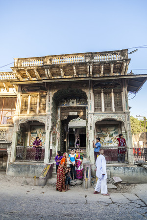 BIKANER, INDIA - OCT 24, 2012: facade of beautiful living house of a former trader family with local people in Bikaner, India.のeditorial素材