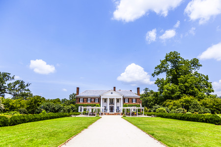 MOUNT PLEASANT, USA - JULY 21, 2010:  Boone Hall Plantation and Gardens in Mount Pleasant, USA. The House was built in 1933 in colonial revival style and is listed in the National Register of Historic places.のeditorial素材
