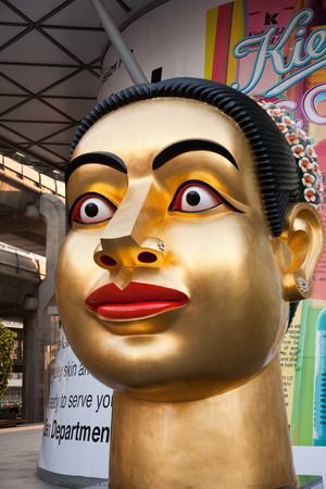 BANGKOK, THAILAND - MAY 7, 2009: Buddah statue at the central shopping place in Bangkok, Thailand.  Around 85 percent of the people in Thailand are buddhists.のeditorial素材