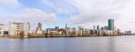 FRANKFURT, GERMANY - FEB 24, 2015: Westhafen tower in the harbor area in Frankfurt, Germany. The West harbor Tower won the Martin-Elsaesser-plate in 2004 due to his unique architecture.のeditorial素材