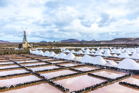 salt piles in the saline of Janubio in Lanzaroteの写真素材
