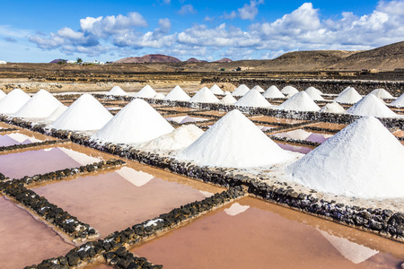 salt piles in the saline of Janubio in Lanzaroteの写真素材