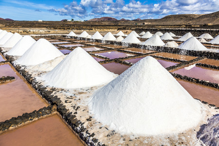 salt piles in the saline of Janubio in Lanzaroteの写真素材