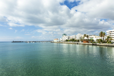 seaside view to promenade of Arrecife, Lanzarote with boatsのeditorial素材