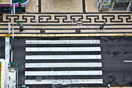 LISBON, PORTUGAL - DEC 28, 2008: birds view to a crosswalk in the old part of Lisbon, Portugal. Lisbon is one of the oldest cities in the world, and the oldest in Western Europe. Julius Caesar made it a municipium called Felicitas Julia, adding to the namのeditorial素材