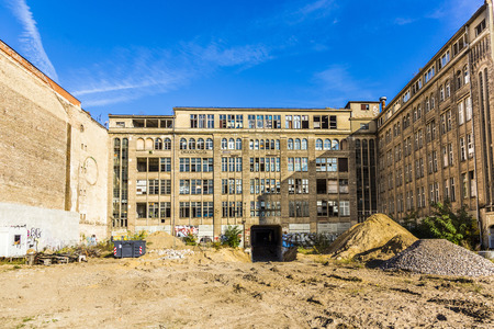 BERLIN, GERMANY - NOV 28, 2014: view to facade of a demlition house in Berlin, Germany. Due to ongoing clarification of ownership the rate of old houses in Berlin is still high.のeditorial素材