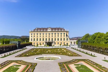 VIENNA, AUSTRIA - APRIL 24, 2015: Schonbrunn Palace with prince garden view in Vienna, Austria.  The former imperial summer residence is  Viennas most visited tourist attraction.のeditorial素材