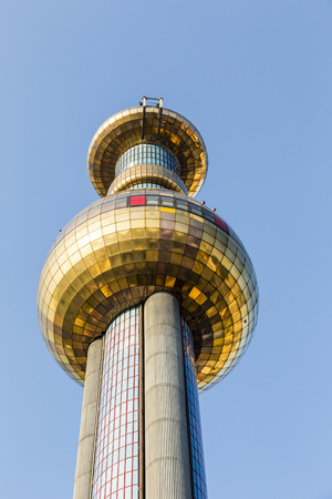 VIENNA, AUSTRIA - APRIL 2015: Tower of Garbage-processing plant in Vienna, Austria. Designed by Friedensreich Hundertwasser. It was inaugurated in 1992 and heats 60000 apartmentsのeditorial素材