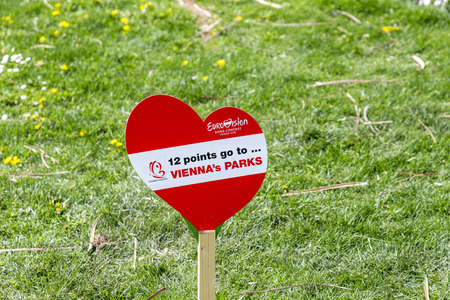 VIENNA, AUSTRIA - APR 27, 2015:  heart shape poster in the park for the european song contest in Vienna, Austria. Conchita Wurst was the winner in the last year.のeditorial素材