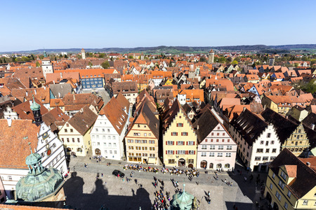 ROTHENBURG, GERMANY - APR 19, 2015: aerial of the market place of Rothenburg ob der Tauber, Germany. The medieval town attracts over 2 million visitors every year.のeditorial素材