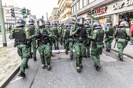 FRANKFURT, GERMANY - MAR 18, 2015: people demonstrate against EZB and Capitalism in Frankfurt, Germany. 30 tsd. people join the demo.のeditorial素材