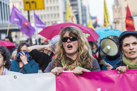 FRANKFURT, GERMANY - MAR 18, 2015: people demonstrate against EZB and Capitalism in Frankfurt, Germany. 30 tsd people demonstrate. They are holding banners.のeditorial素材