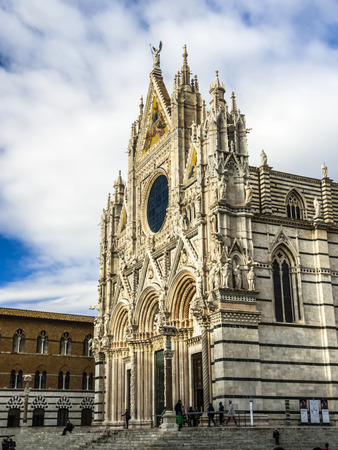 SIENA, ITALY - DEC 27, 2013: Santa Maria Assunta Cathedral in Siena, Italy. Made between 1215 and 1263, it is a major tourism attraction in Siena.のeditorial素材