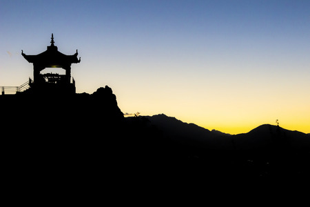 silhouette of buddhistic temple in the himalaya mountains of province Ladakh in Indiaの写真素材