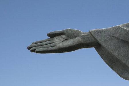 RIO DE JANEIRO - BRAZIL, JAN 30, 2015: hand of Christ the Redeemer statue, created by French sculptor Paul Landowski at top the Corcovado Mountain in Rio de Janeiro, Brazil.のeditorial素材