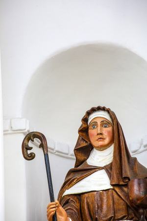 COPACABANA, BOLIVIA - JAN 21, 2015: Virgen de Copacabana dressed as nun with the walking stick as symbol for love to god in the church in Copacabana, Bolivia.のeditorial素材