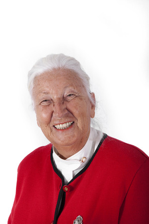 happy smiling senior woman with red jacketの写真素材
