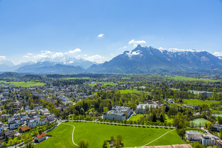 view to the old city of Salzburg from the castle Hohensalzburg hill, Austriaの写真素材