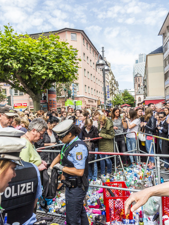 FRANKFURT, GERMANY - JUNE 26, 2015: people at the security check  for the visit of queen Elizabeth II at the Roemer market square in Frankfurt, Germany.のeditorial素材