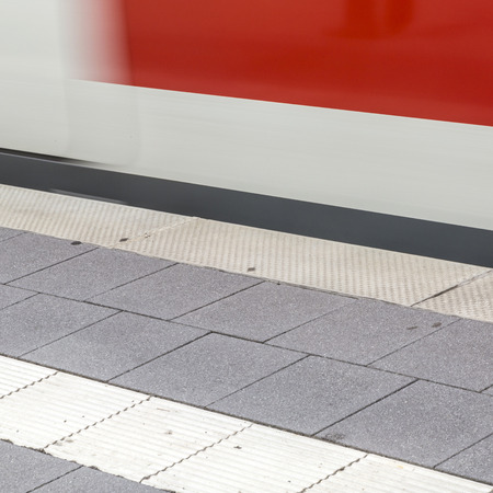 detail of train fast moving at subway stationの写真素材