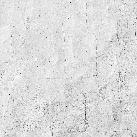 white painted old concrete wall in harmonic colorの写真素材