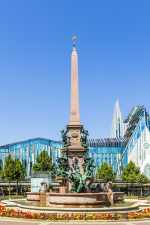 historic fountain in Leipzig on Augustus squareのeditorial素材