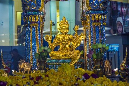 BANGKOK, THAILAND - DEC 22, 2009: people at famous Erawan shrine in Bangkok, Thailand. The shrine was the goal of a bomb assassination in AUG 2015.のeditorial素材