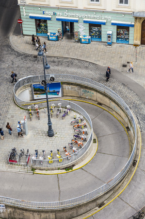 VIENNA - APR 24, 2015: aerial of crowded Stephansplatz in Vienna, Austria with parking garage. Several popular pedestrian routes begin here and a lot of tourists visit this place.のeditorial素材