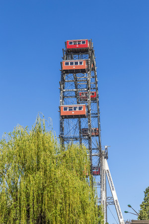 VIENNA, AUSTRIA - APR 25, 2015: A view of the Wiener Riesenrad in Prater from outside the park. The big wheel was constructed in 1897 by the English engineer  Walter Bassettのeditorial素材
