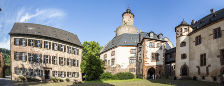 BUEDINGEN, GERMANY - AUG 30, 2015: old castle in medieval city of Buedingen, Germany.  Buedingen castle was built from a Hohenstaufen moated castle in the 12th century.のeditorial素材