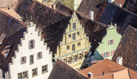 red old shingle roofs in Rothenburg ob der Tauberの写真素材