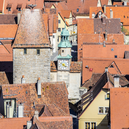 red old shingle roofs in Rothenburg ob der Tauberの写真素材