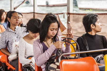 BANGKOK, THAILAND - MAY 12, 2009: people travel by boat in Bangkok, Thailand.  Chao Phraya is a major river in Thailand, low alluvial plain forming the centre of the country.のeditorial素材