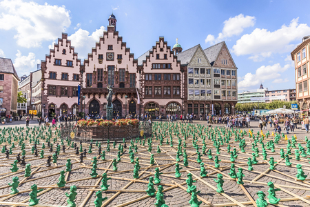 FRANKFURT, GERMANY - SEP 11, 2015: figures from Ottmar Hoerl to celebrate the 25th anniversary of Germanys reunion in Frankfurt, Germany on public places.のeditorial素材