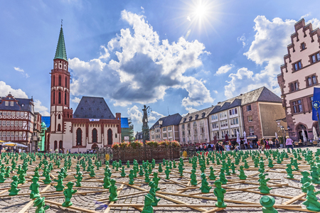 FRANKFURT, GERMANY - SEP 11, 2015: figures from Ottmar Hoerl to celebrate the 25th anniversary of Germanys reunion in Frankfurt, Germany on public places.のeditorial素材