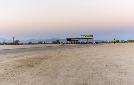 DESERT CENTER, USA - JULY 7, 2008: petrol station in late afternoon at Desert Center, USA. The small village in the desert has a population of 204 people.のeditorial素材