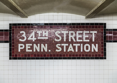 New York, USA - October 21, 2015: old vintage sign in the metro at the 34th Street Pennsylvania Station Subway stop in New York City.のeditorial素材