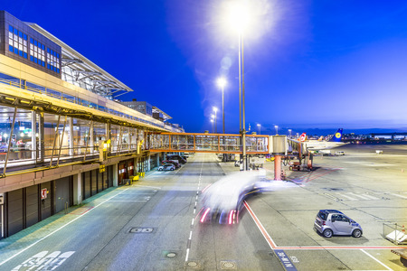 HAMBURG, GERMANY - NOV 12, 2015: Aircraft at the finger in the modern Terminal 2  in Hamburg, Germany. Terminal 2 was completed in 1993 and houses Lufthansa and other Star Alliance partners.のeditorial素材