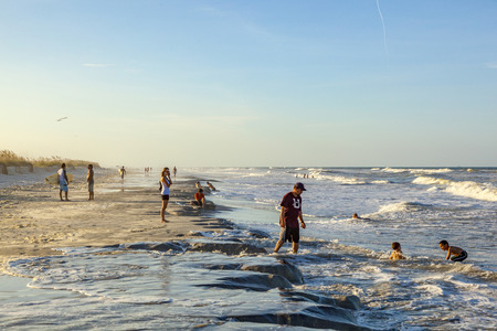 ST. AUGUSTINE, USA - JULY 23, 2010: people enjoy the beautiful beach in St. Augustine, USA. St. Augustine, Florida, was founded in 1565 and beside the historical sites famous for its beaches.のeditorial素材