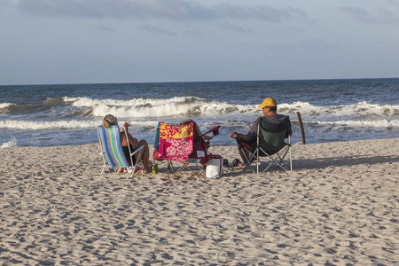 ST. AUGUSTINE, USA - JULY 23, 2010: people enjoy the beautiful beach in St. Augustine, USA. St. Augustine, Florida, was founded in 1565 and beside the historical sites famous for its beaches.のeditorial素材