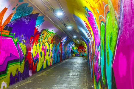 New York, USA - OCT 22, 2015: mural paintings at wall of metro station in 191st Street, New York, USA. Some of the old tunnels are legally open for artists for their mural paintings.のeditorial素材